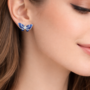 Elegant butterfly earrings with blue stones.