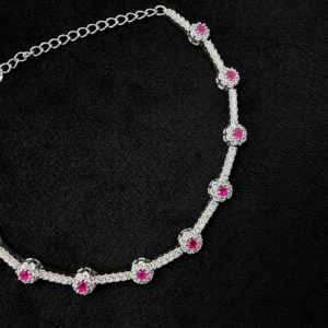 Silver bracelet with pink gemstones