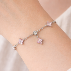 Silver bracelet with pink flowers